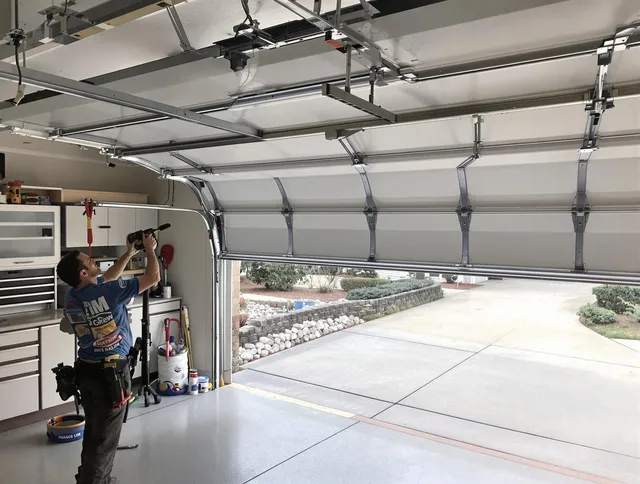 Garage door track repair service by Bay Village Garage Door Repair in Bay Village